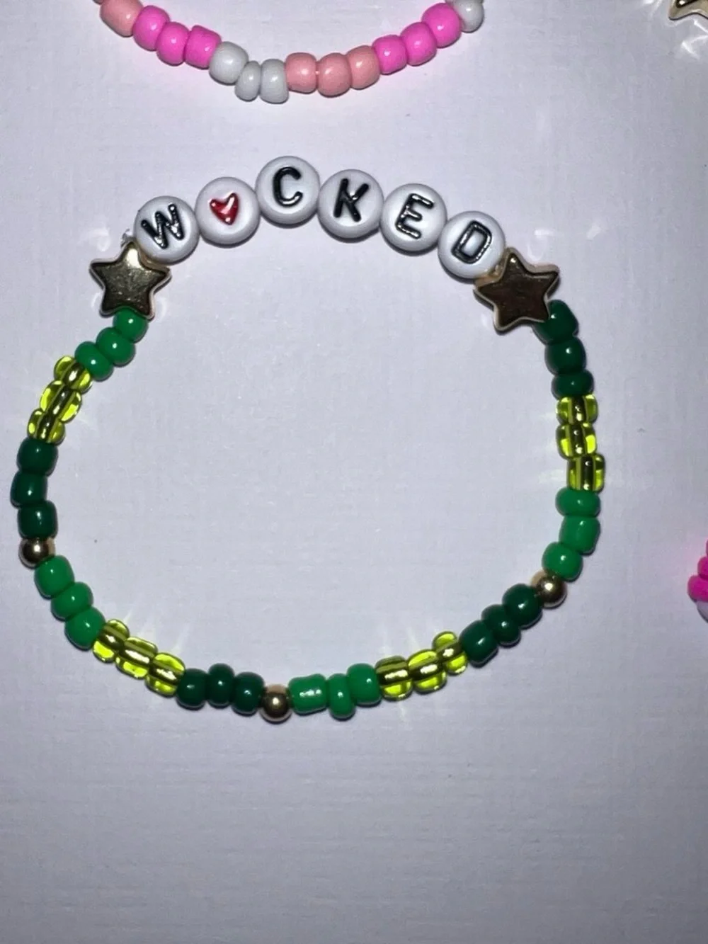 4 Wicked beaded bracelets.